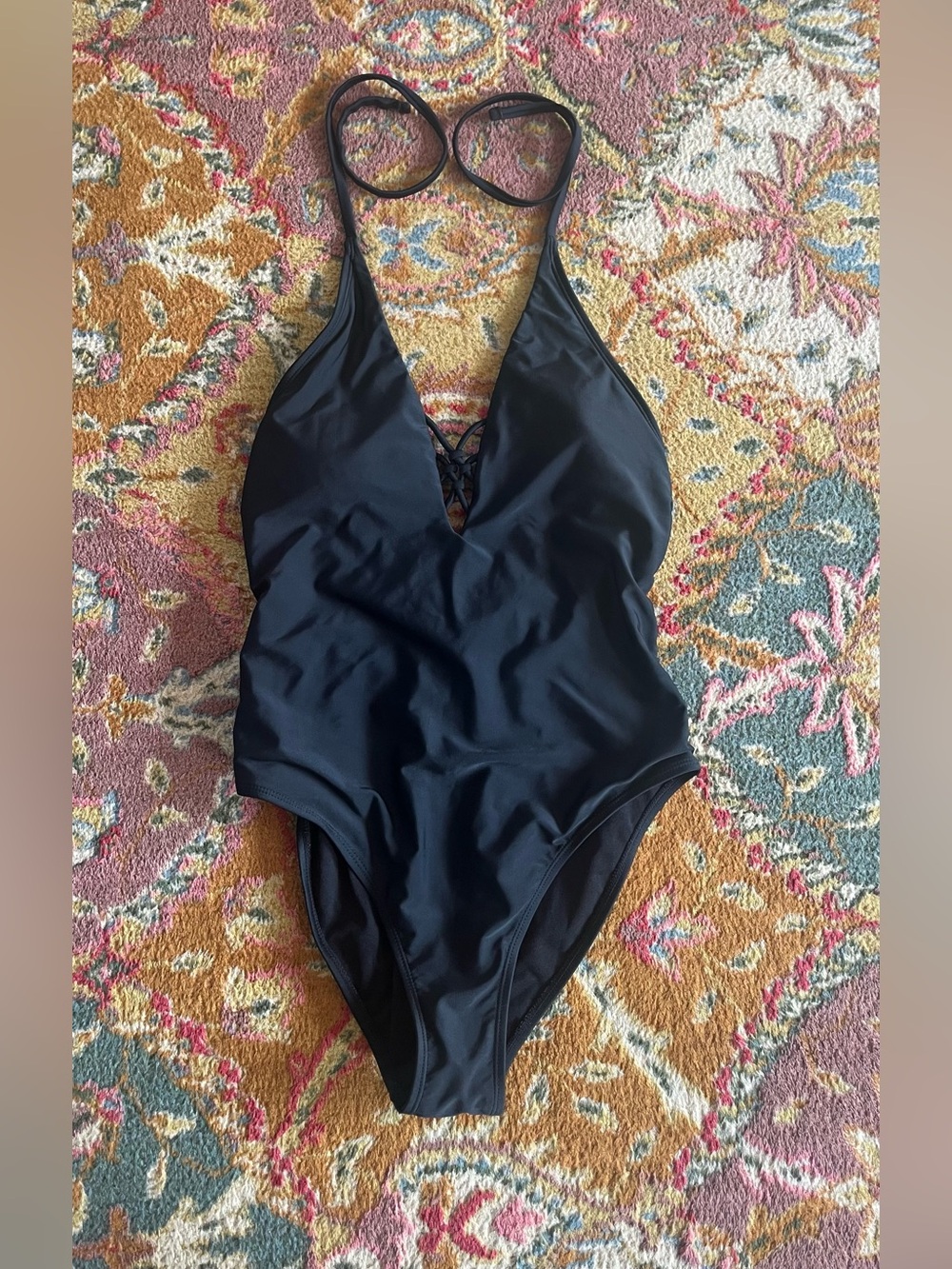 Black Deep V One-Piece Swimsuit with Lace-Up Front & Back details.Excellent
